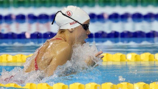 Rachel Nicol competes in women's 100m breaststroke.