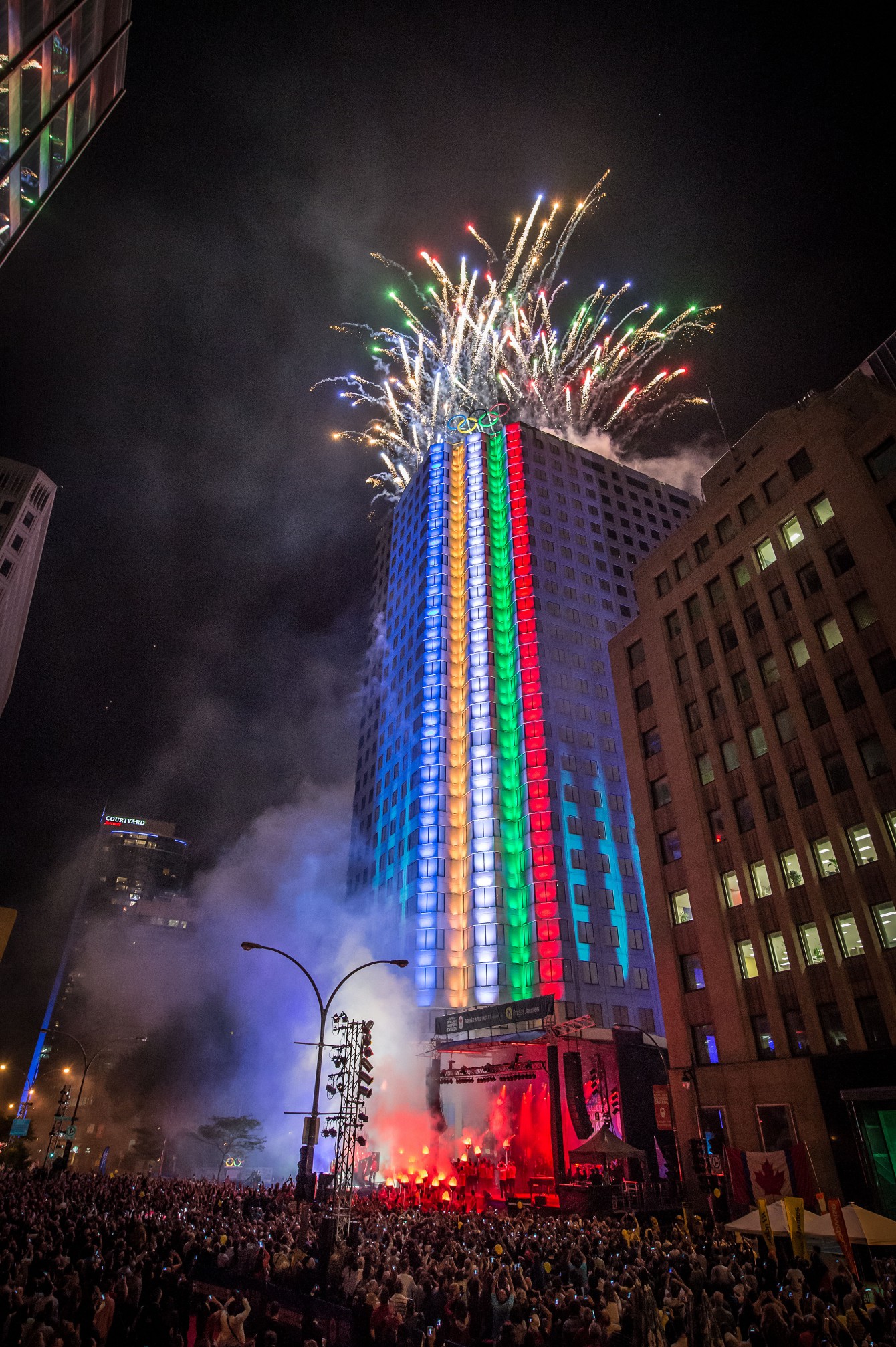 With a dramatic lighting sequence and a burst of fireworks, the Olympic rings lit up the Montreal sky on July 9, 2015.
