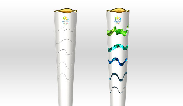 "The moment of the kiss" transforms the torch from its depiction on the left to the one on the right when the flame is passed on the a new torch bearer.