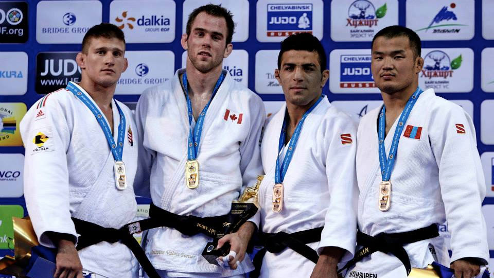 Antoine Valois-Fortier (second from left) is golden in Ulaanbaatar, Mongolia on July 4, 2015 (Photo: IJF Media by G. Sabau).