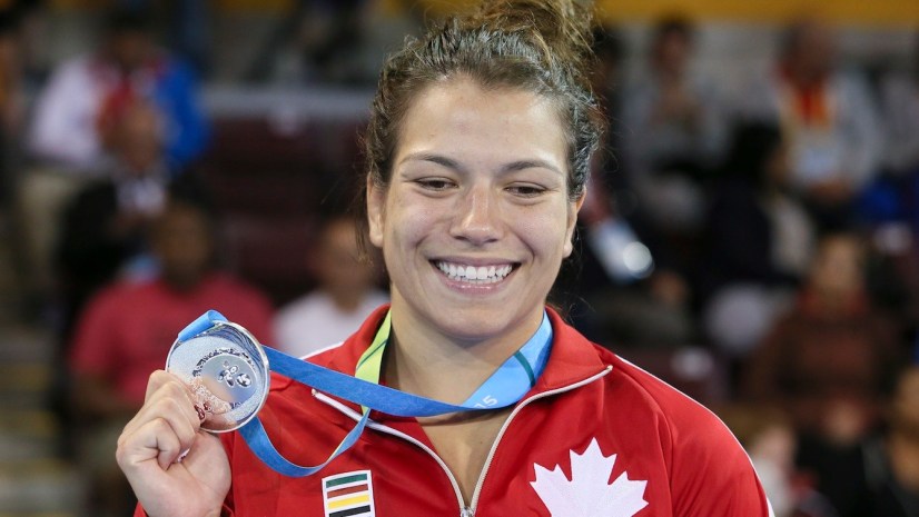 Justine Di Satsio (red) of Coquitlam, B.C. was the silver medalist
