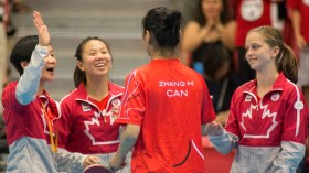 Canadian women's table tennis team celebrating their win