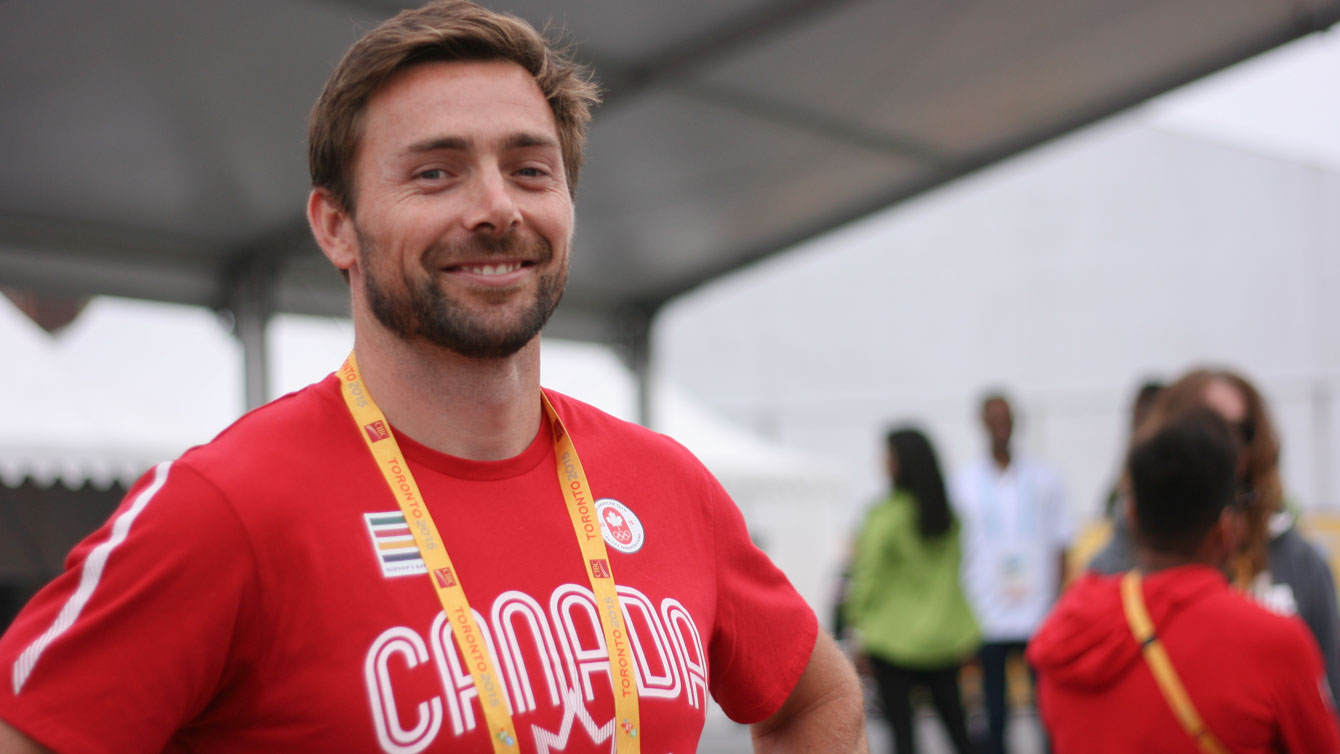 Team Canada flag bearer for the Opening Ceremony Mark Oldershaw at the athletes' village opening for Toronto 2015 Pan American Games (Photo: Alexandra Fernando).