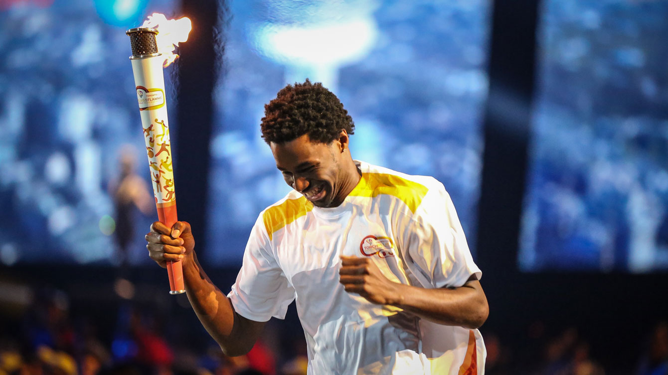 NBA star Andrew Wiggins with the Pan Am torch at the Opening Ceremony in Toronto on July 10, 2015 (Photo: Alexandra Fernando).