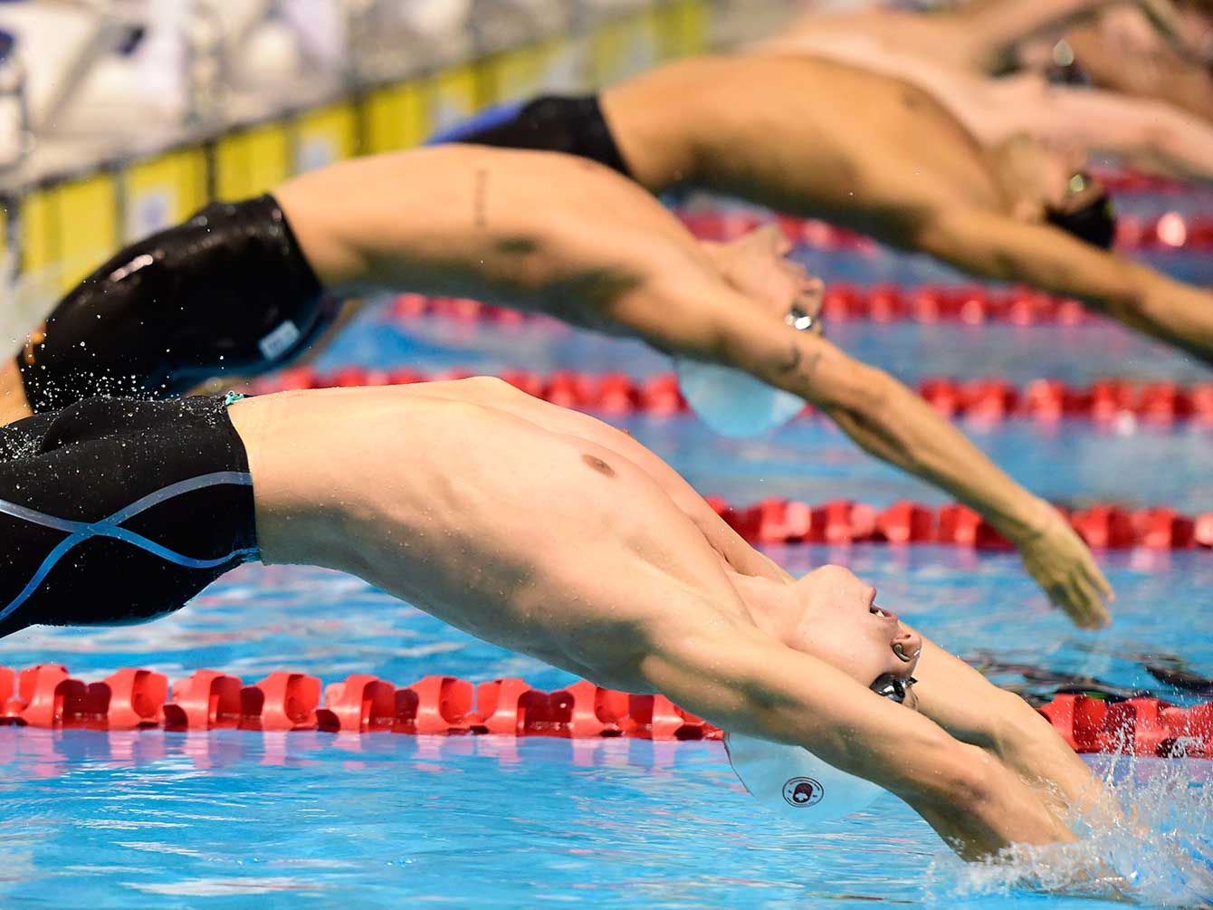 Canada's Russell Wood begins his 200m backstroke at the Toronto 2015 Pan American Games. 