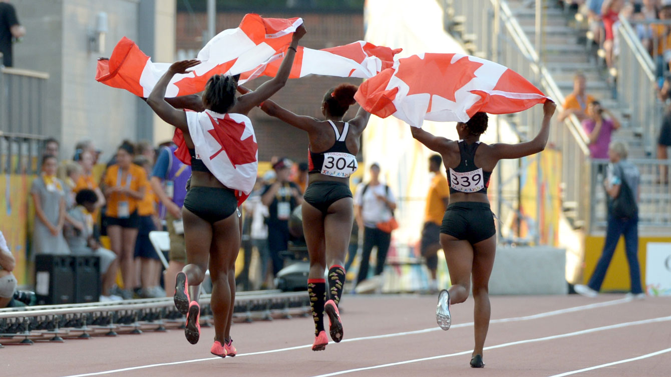 Canadian women's 4x100m Pan Am Games relay team takes a celebratory lap after winning bronze on July 25, 2015.