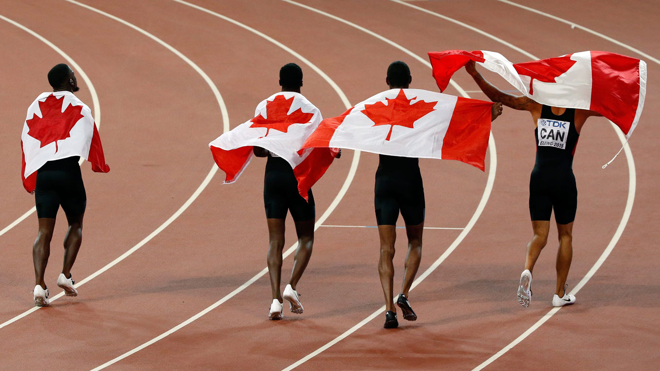 Canadians of the men's 4x100m relay after being awarded the bronze at the world championships in Beijing on August 29, 2015. 