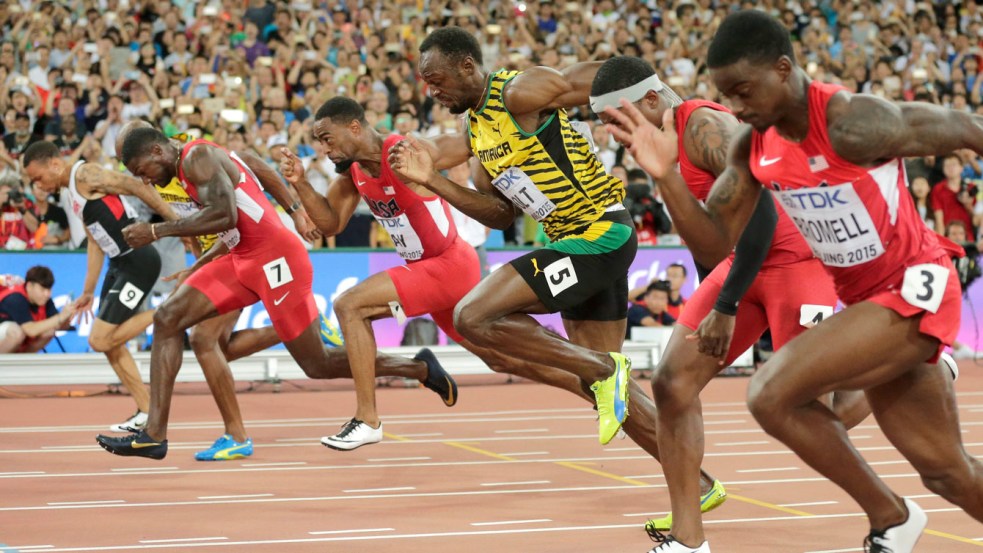 Andre De Grasse (outside, far left) leans in for bronze as Usain Bolt (5) and Justin Gatlin (7) battle for gold and silver in the closing moments of the 100m final at the IAAF World Championships in Athletics in Beijing, China on August 23, 2015.