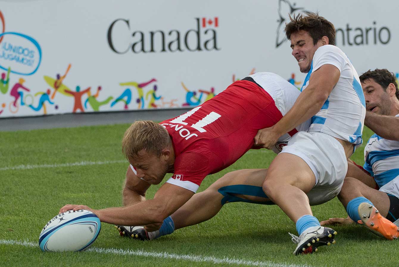 Harry Jones fights for a try in the final seconds of the TO2015 gold medal game. 