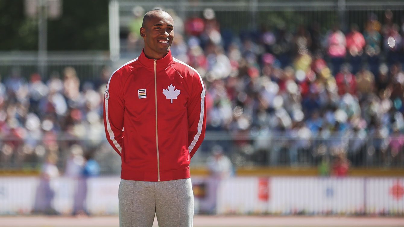 Damian Warner on the podium prior to receiving his decathlon gold medal at Toronto 2015 Pan American Games.