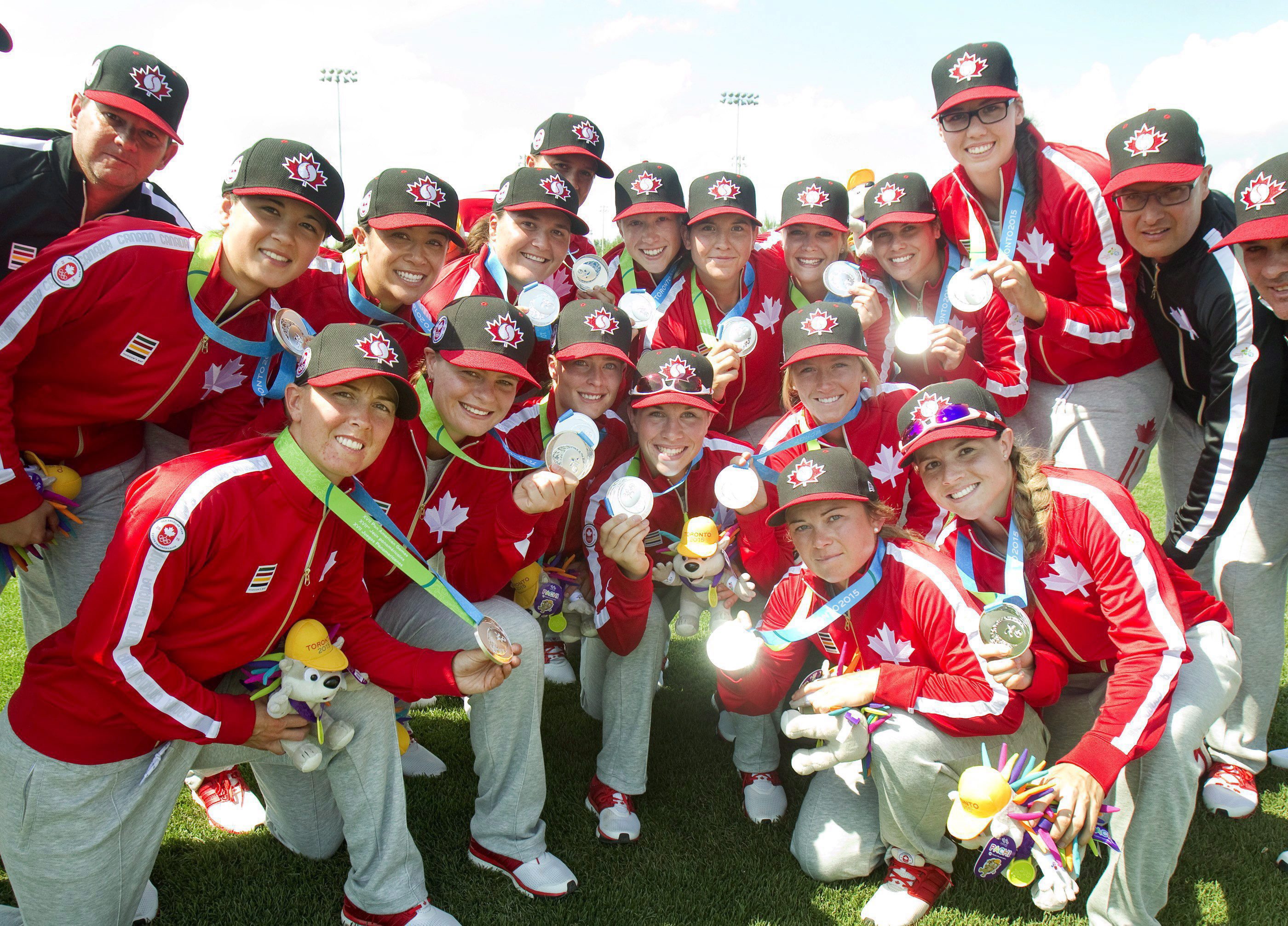 Team Canada poses poses with their silver medals