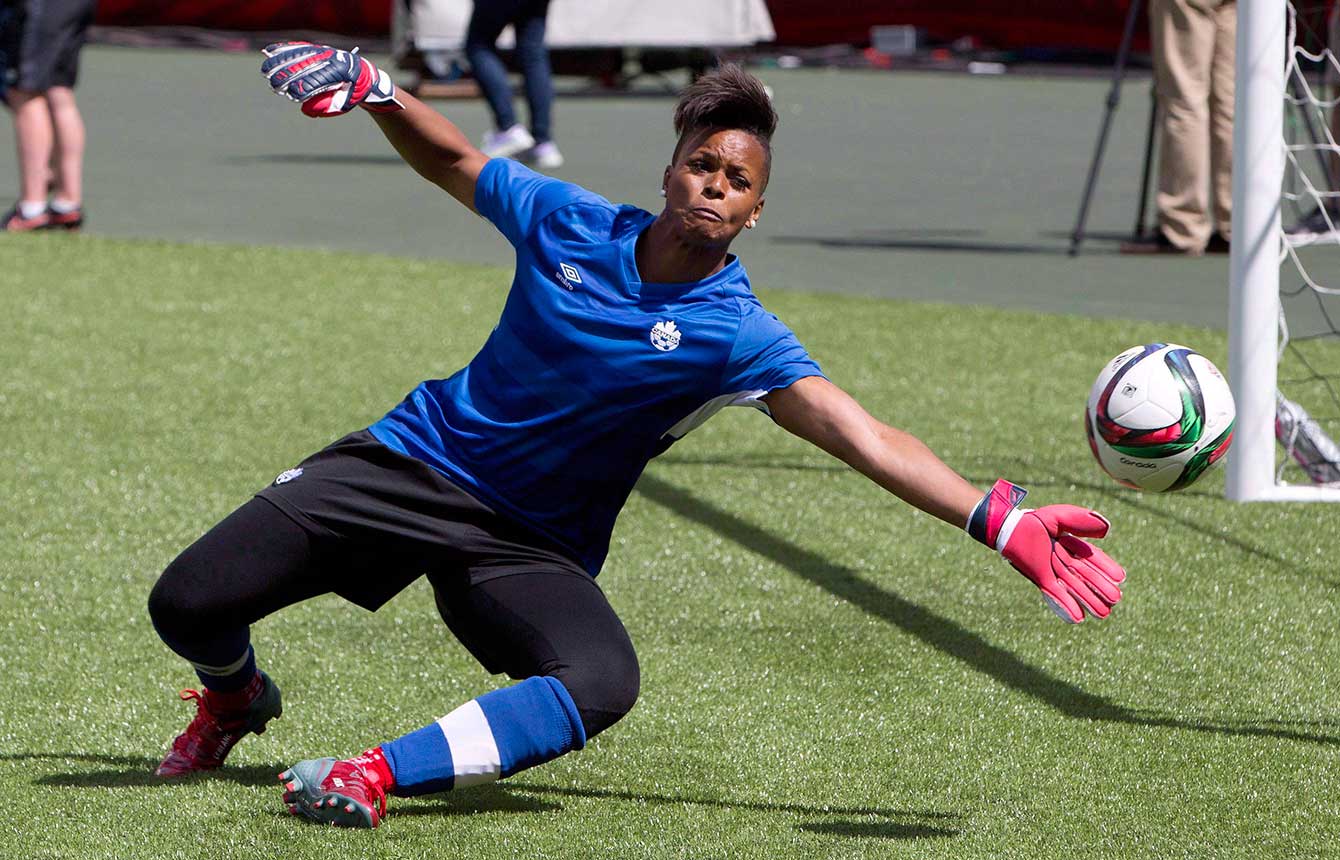 Karina LeBlanc stopping a shot in practice