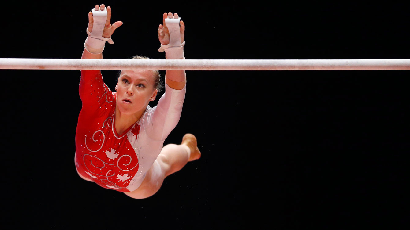 Ellie Black competes in the uneven bars at the world artistic gymnastics championship all-around finals in Glasgow on October 29, 2015.