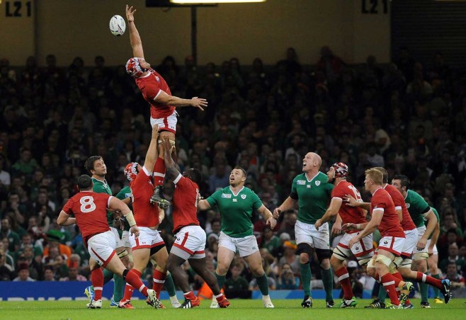 Canada's captain Jamie Cudmore jumps for the ball during their Rugby World Cup Pool D match against Ireland at the Millennium Stadium, Cardiff, Wales, Saturday Sept. 19, 2015. (AP Photo/Rui Vieira)