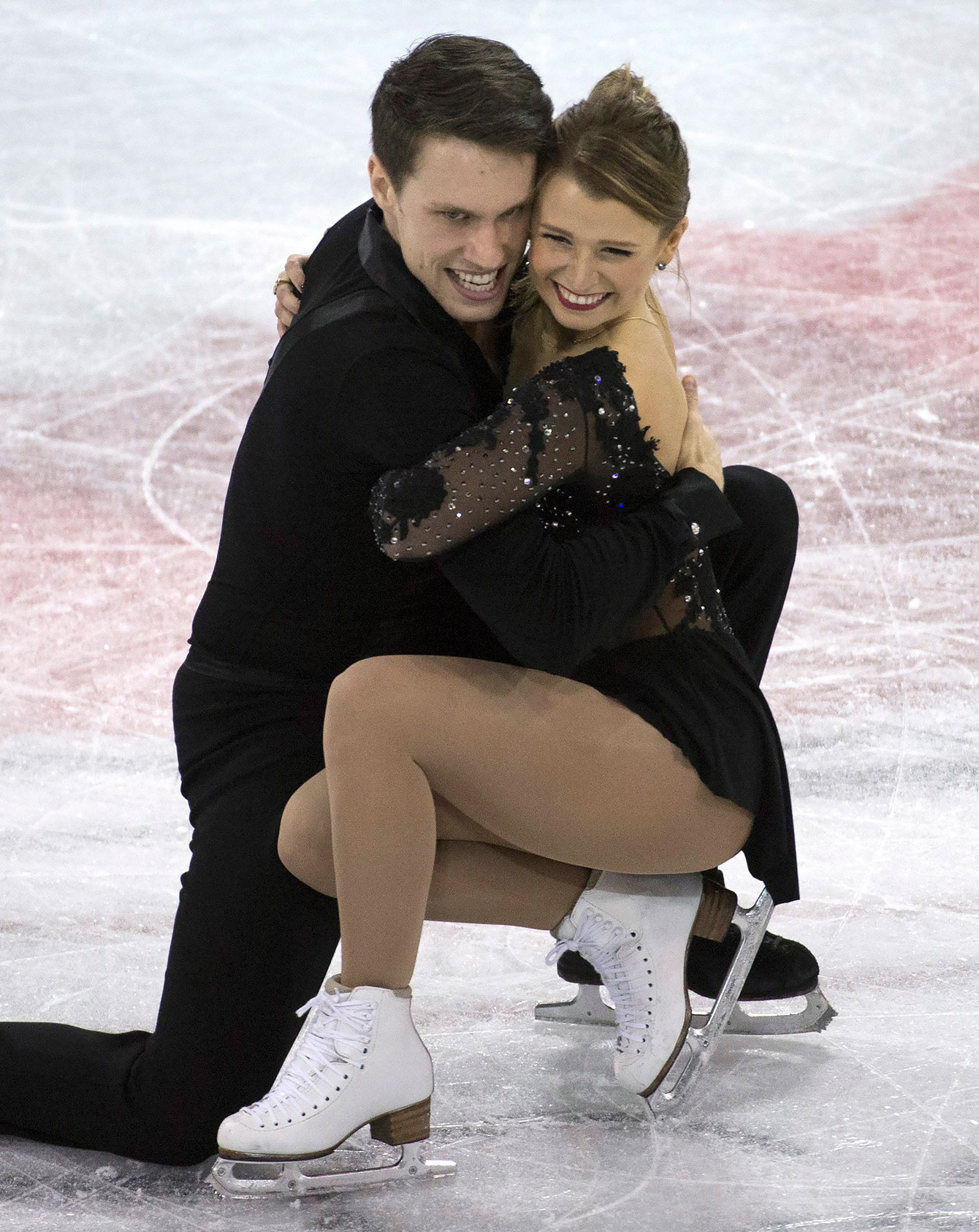 Kirsten Moore-Towers and Michael Marinaro at Skate Canada International on October 30, 2015. 