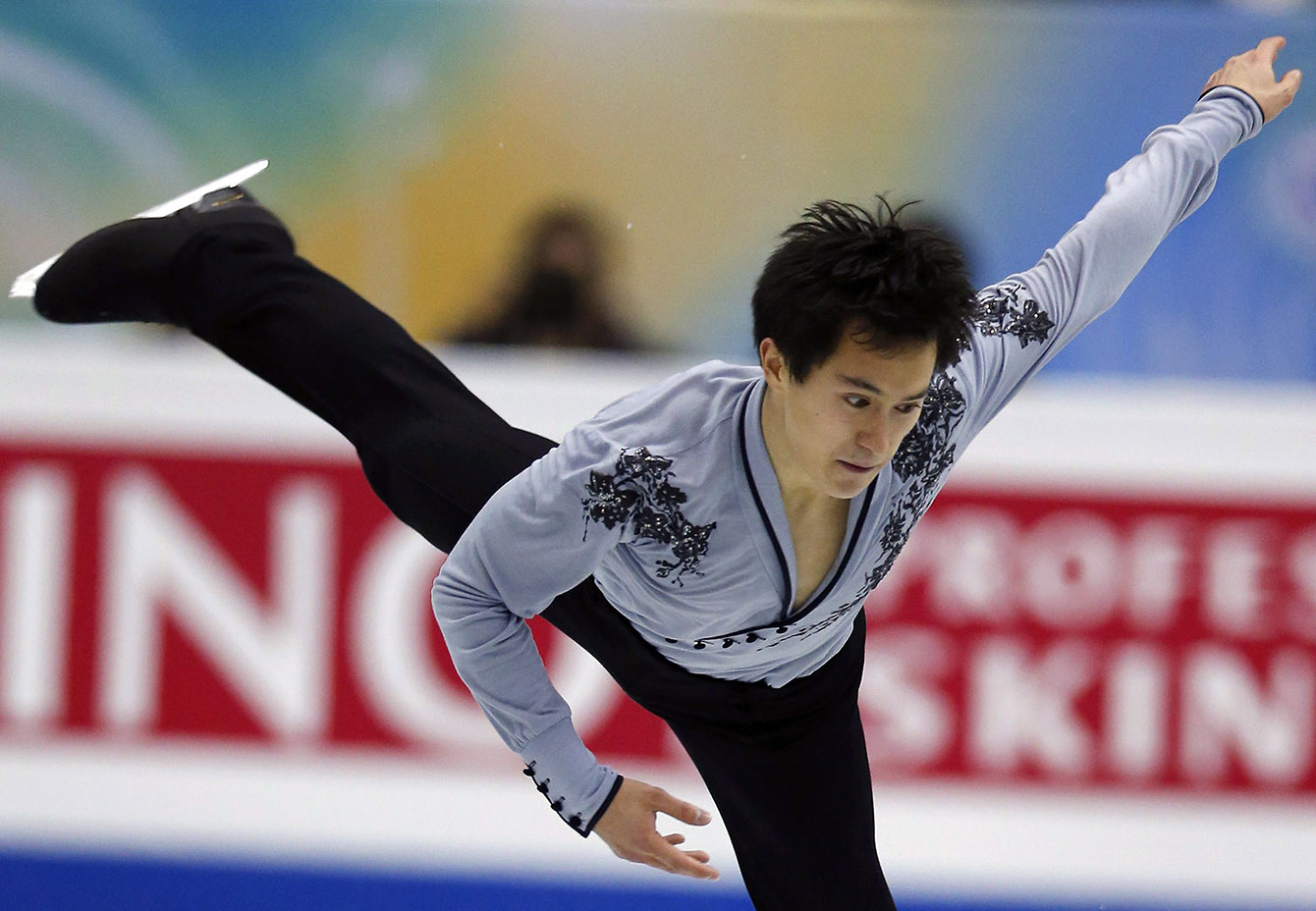 Chan performs during the ISU Grand Prix Final figure skating in Fukuoka, western Japan, Friday, Dec. 6, 2013. (AP Photo/Shizuo Kambayashi)