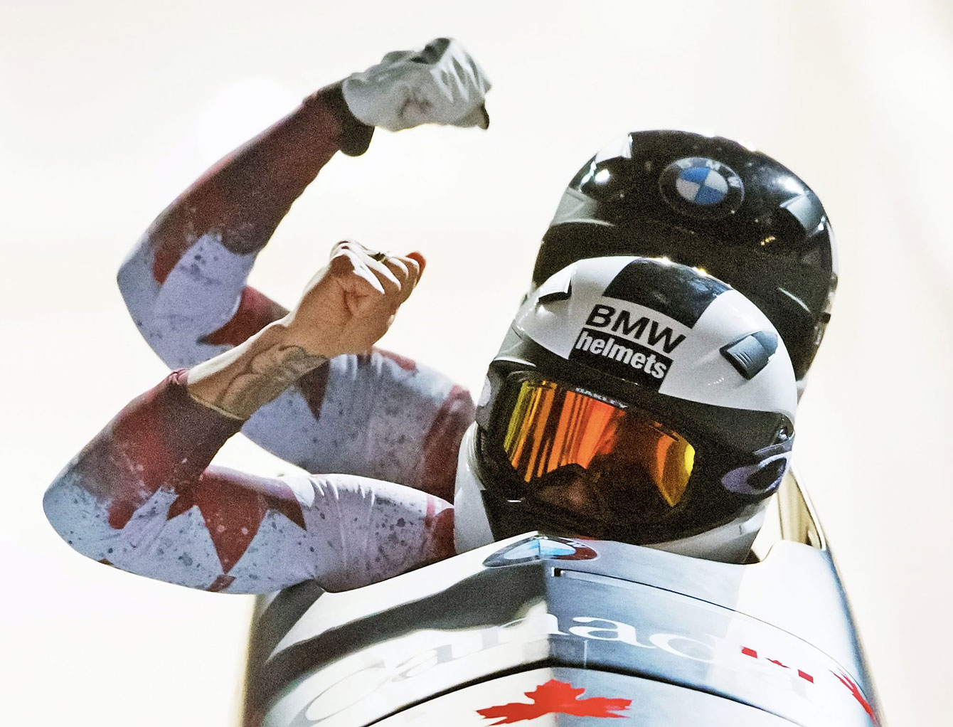 Kaillie Humphries and Melissa Lotholz react after winning the opening race of the 2015-16 bobsleigh World Cup season in Altenberg, Germany on November 27, 2015.