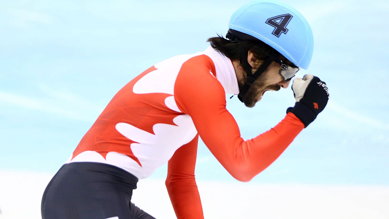 Charles Hamelin celebrates winning the men's 1500m final at the World Cup in Shanghai, China on December 12, 2015.
