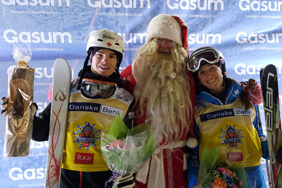 Mikael Kingsbury (left) with women's moguls winner Mikaela Matthews (right) in Ruka Finland on December 12, 2015 (Photo: Joe Fitzgerald/FIS).