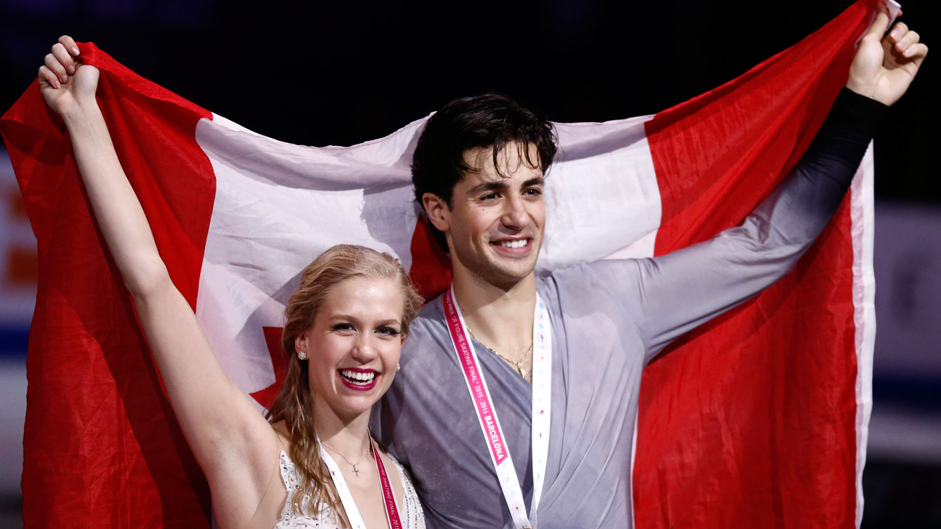 Kaitlyn Weaver and Andrew Poje on the podium after winning the ice dance title at the Grand Prix Final in Barcelona on December 12, 2015. 