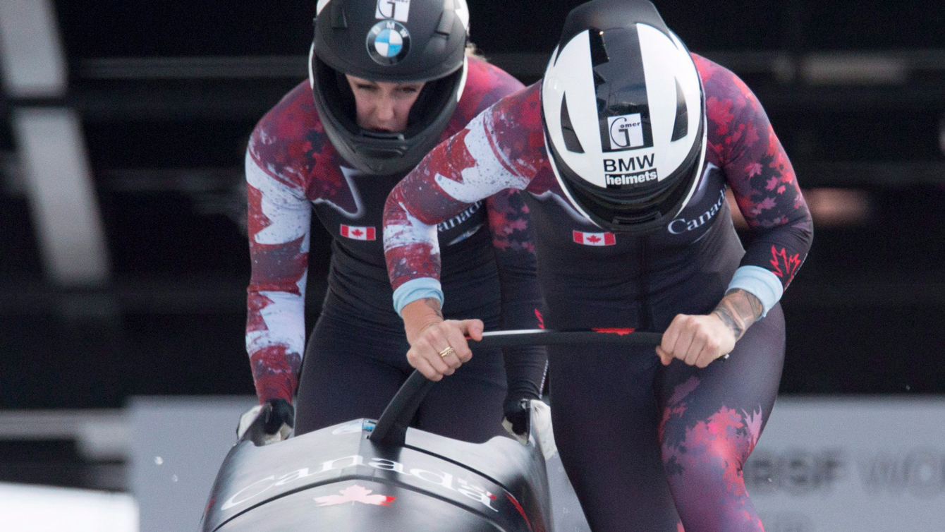Kaillie Humphries and Melissa Lotholz race during the first run of women's bobsled at the IBSF World Cup in Whistler, B.C., Saturday, Jan. 23, 2016. 