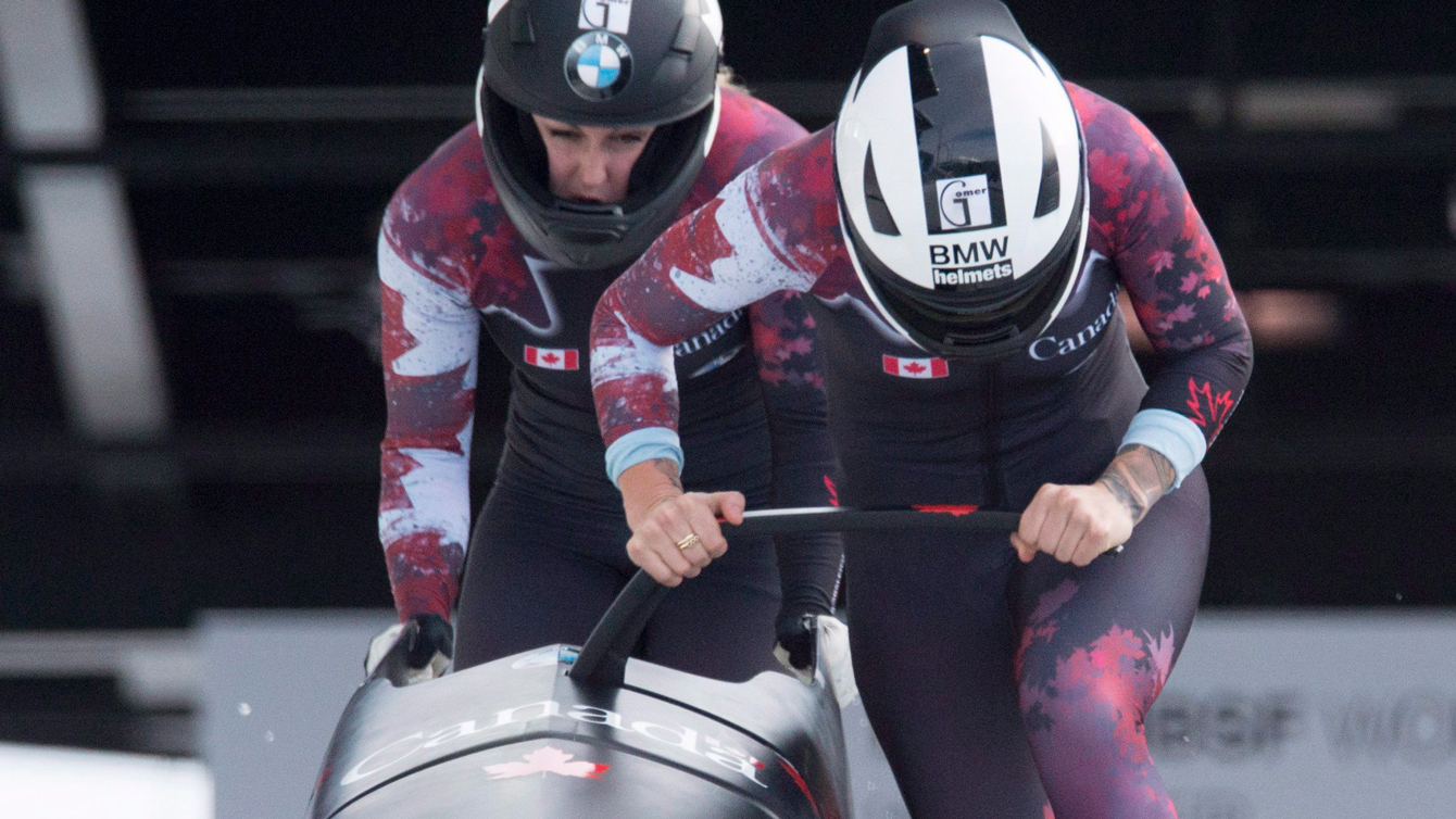 Kaillie Humphries and Melissa Lotholz race during the first run of women's bobsled at the IBSF World Cup in Whistler, B.C., Saturday, Jan. 23, 2016.