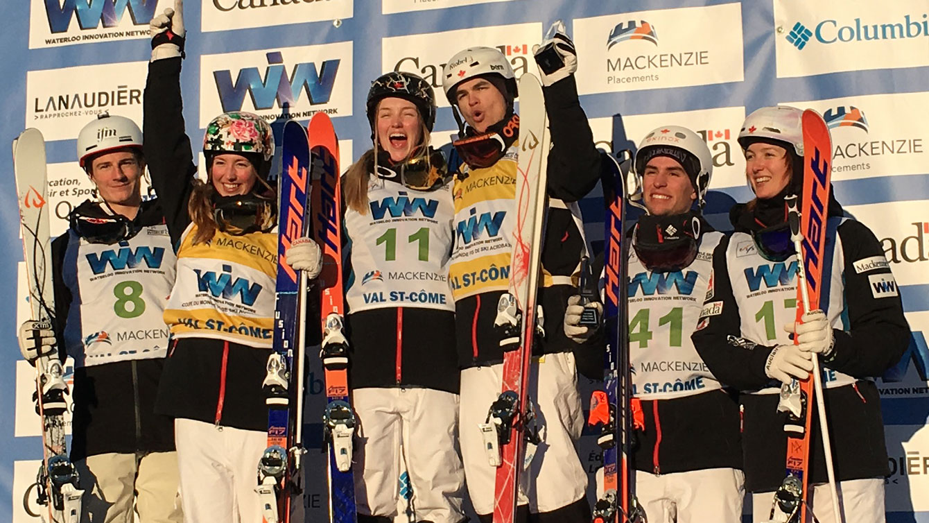 Canada dominates the podium at Val Saint-Come with five of six medals in the men's and women's World Cup races. Left to right starting with the first Canadian are Chloe Dufour-Lapointe, Justine Dufour Lapointe, Mikael Kingsbury, Laurent Dumais and Maxime Dufour Lapointe. Australia's Matt Graham (far left) is the only non-Canadian to make the podium in Quebec on January 23, 2016.