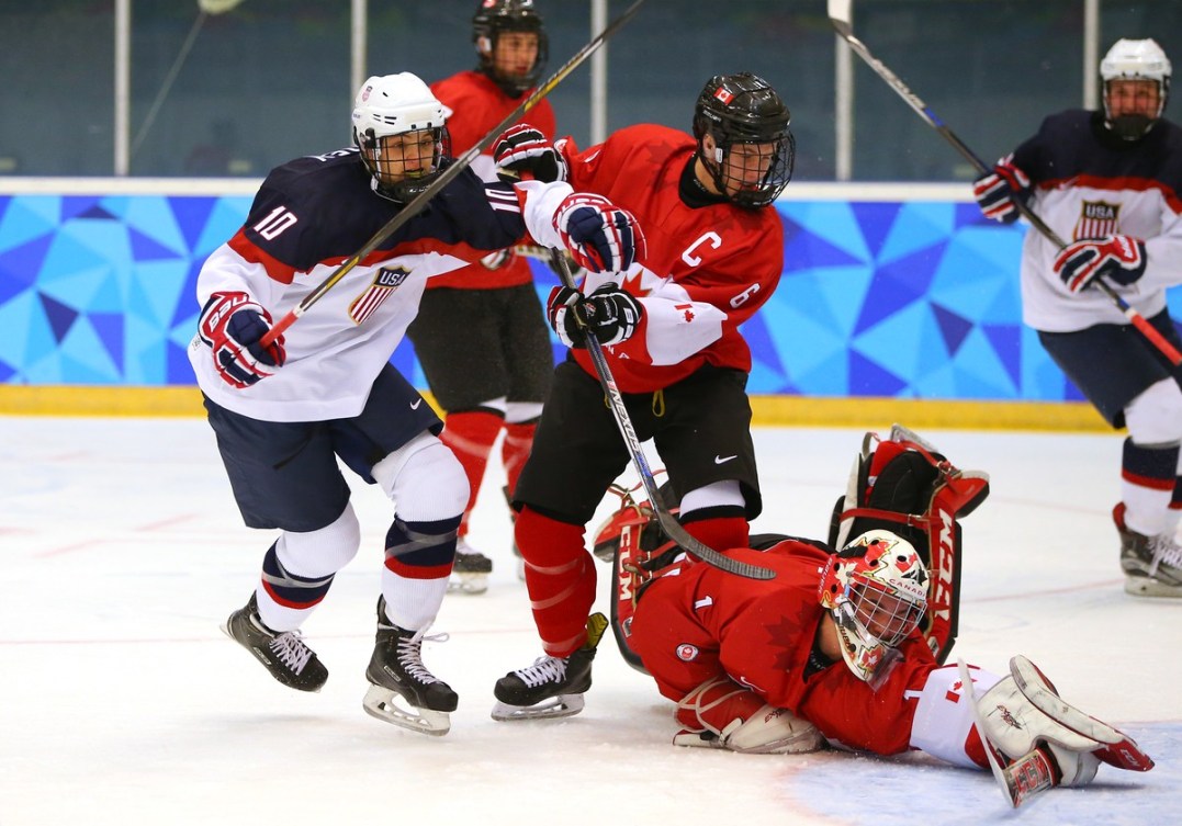 Alexis Gravel CAN (Rights) fails to stop a goal by TJ Walsh (unseen) as Jonathan Gruden USA (Left) looks on during the Ice Hockey men's final between Canada and USA at the Kristins Hall during the Winter Youth Olympic Games, Lillehammer, Norway, 21 February 2016. Photo: Al Tielemans for YIS/IOC Handout image supplied by YIS/IOC