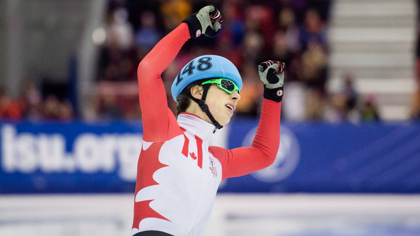 Charle Cournoyer, of Canada, celebrates a gold medal in men's 1000m at the ISU World Cup Short Track speed skating event in Toronto on Sunday, November 8, 2015.