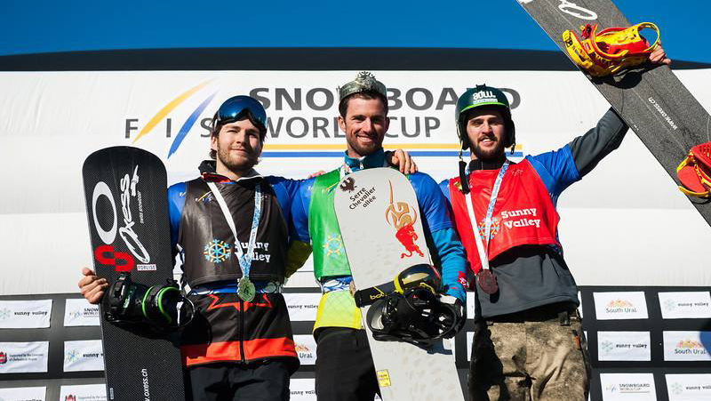 Chris Robanske (left) celebrates a World Cup silver medal in snowboard cross in Russia on February, 21, 2016. (Miha Matavz/FIS )