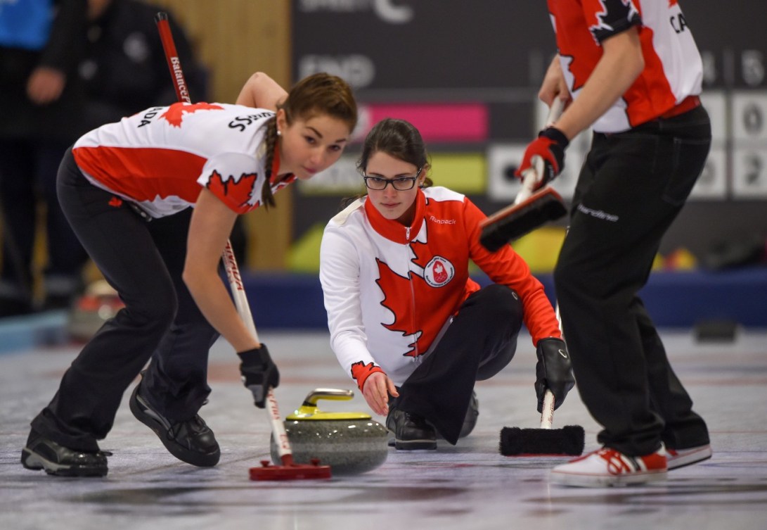 Karlee Burgess, Mary Fay and Sterling Middleton CAN in action during the Gold Medal Game of the Curling Mixed Team Finals at the Lillehammer Curling Hall during the Winter Youth Olympic Games, Lillehammer Norway, 17 February 2016. Photo: Thomas Lovelock for YIS/IOC Handout image supplied by YIS/IOC