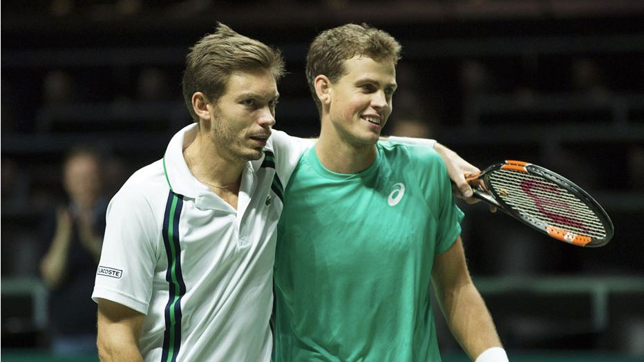 Nicolas Mahut (left), Vasek Pospisil after winning a match in Rotterdam (via ABN AMRO World Tennis Tournament). 