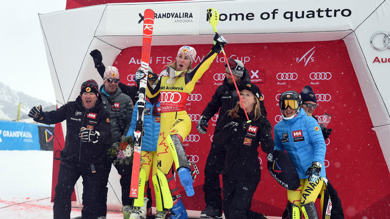 Marie-Michele Gagnon (in yellow) celebrates after winning the women's alpine combined in Andorra on February 28, 2016.