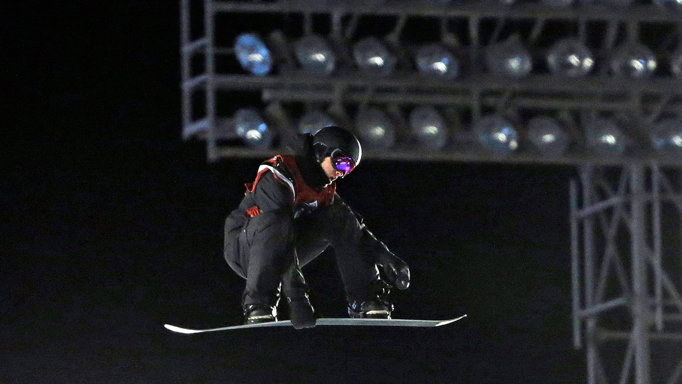 Max Parrot rises at the FIS snowboard big air World Cup on February 11, 2016 in Boston's Fenway Park.