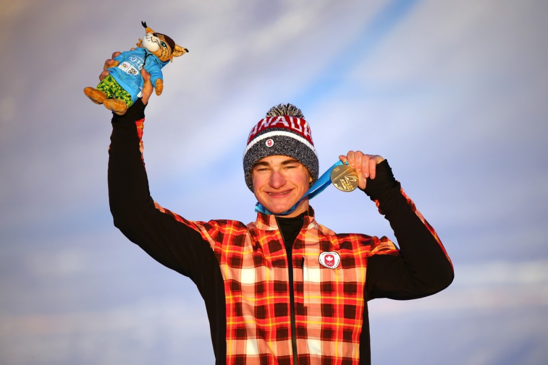 Gold medallist Reece Howden CAN poses on the podium after the Men's Ski Cross at the Hafjell Freepark during the Winter Youth Olympic Games, Lillehammer Norway, 15 February 2016. Photo: Simon Bruty for YIS/IOC Handout image supplied by YIS/IOC