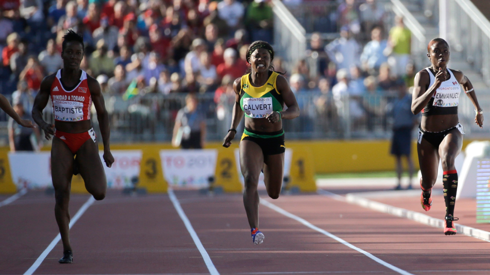 Crystal Emmanuel running down track during the women's 100 meter race at Toronto 2015