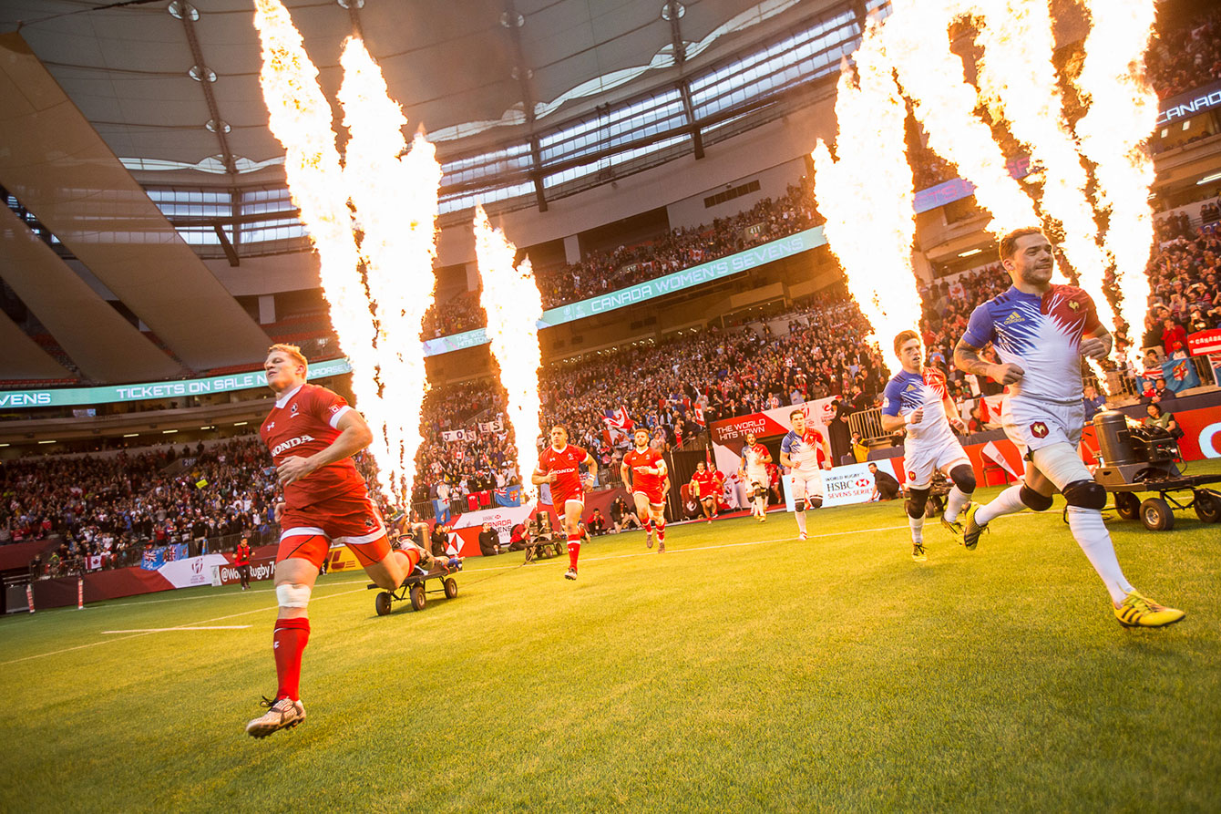 Canada and France sprint out to the pitch ahead of their bowl final match, which the Canadians won 19-17 to earn ninth place in the debut of the World Rugby Sevens Series in Canada on March 13, 2016 (Photo: Derek Stevens via Rugby Canada).