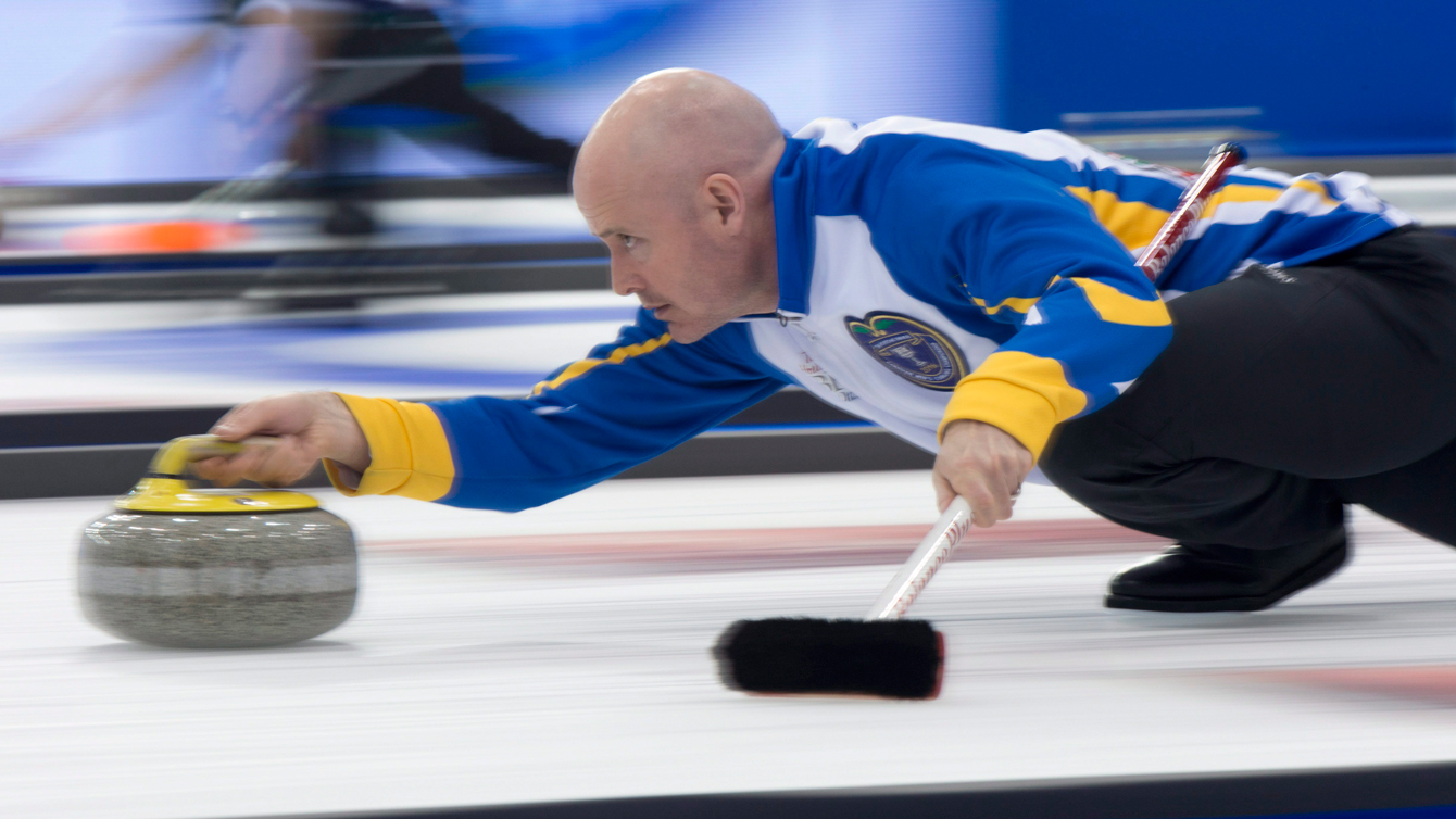 Team Alberta skip Kevin Koe throws a stone against Team Canada at the Brier curling championship in Ottawa on March 10, 2016. (THE CANADIAN PRESS/Adrian Wyld)