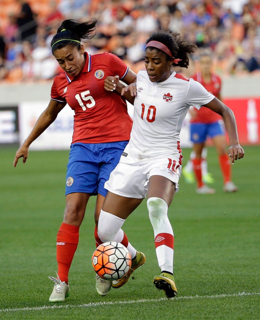 10805946 Canada's Ashley Lawrence (10) challenges Costa Rica's Cristin Granados (15) for the ball during the second half of a CONCACAF Olympic women's soccer qualifying championship semifinal Friday, Feb. 19, 2016, in Houston. Canada won 3-1. (AP Photo/David J. Phillip)