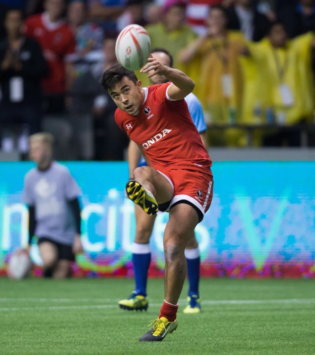 Canada's Nathan Hirayama kicks a conversion to defeat Australia during World Rugby Sevens Series' Canada Sevens tournament action, in Vancouver, B.C., on Saturday, March 12, 2016. THE CANADIAN PRESS/Darryl Dyck