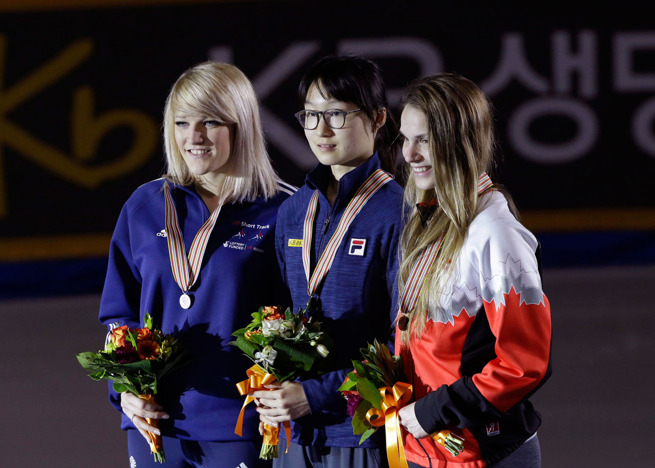 Kasandra Bradette poses with the other medallists