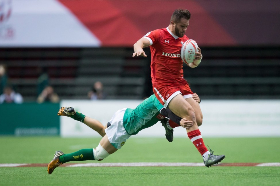 Canada's Admir Cejvanovic, front, is tackled by Brazil's Gustavo Albuquerque during World Rugby Sevens Series' Canada Sevens tournament action, in Vancouver, B.C., on Sunday March 13, 2016. THE CANADIAN PRESS/Darryl Dyck