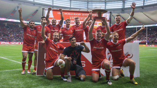 Canada's John Moonlight, front row third left, hoists the Bowl after defeating France during World Rugby Sevens Series' Canada Sevens bowl final action, in Vancouver, B.C., on Sunday March 13, 2016. THE CANADIAN PRESS/Darryl Dyck