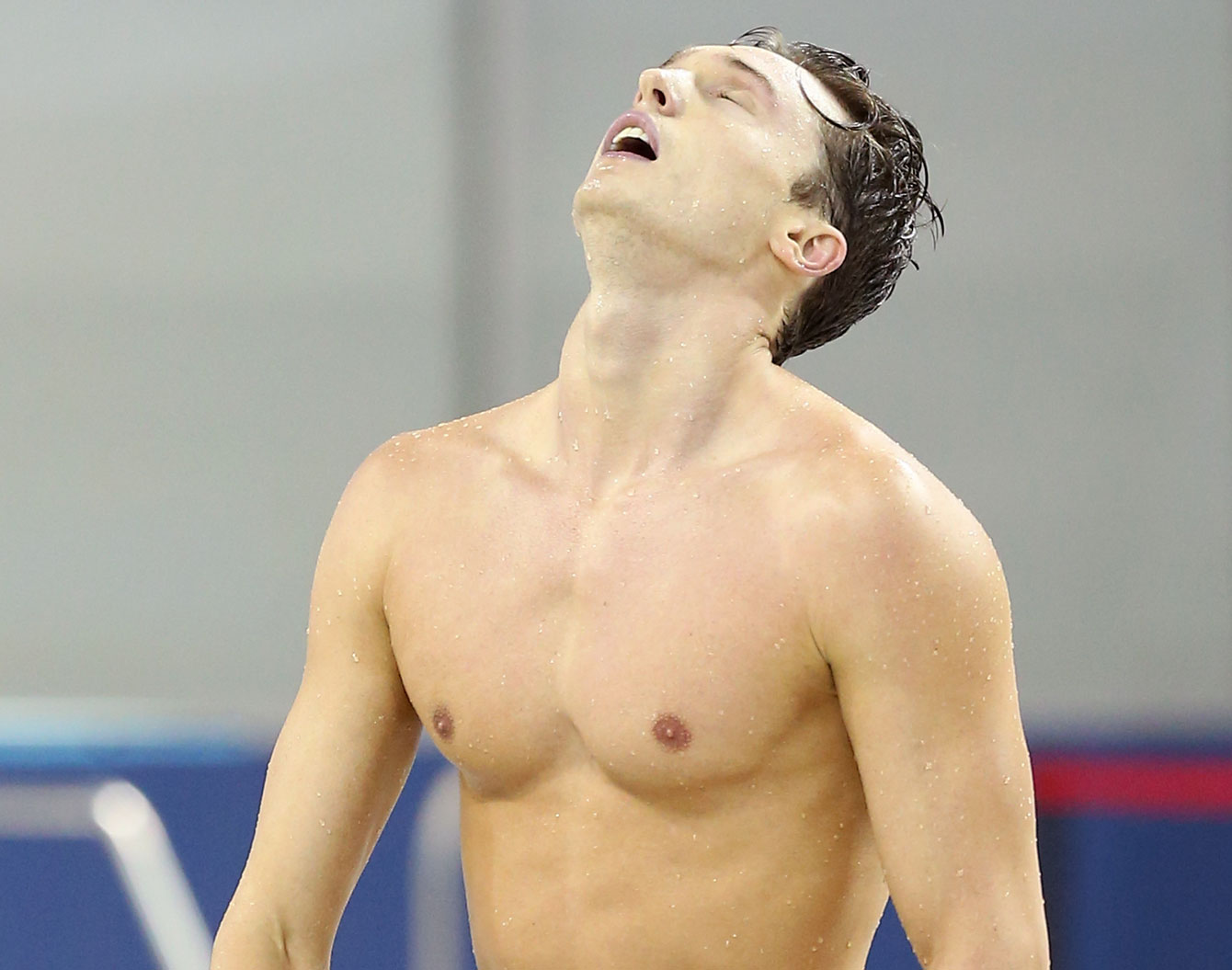 A relieved Ashton Baumann reacts after meeting the Olympic standard on April 7, 2016 (Photo: Scott Grant via Swimming Canada).