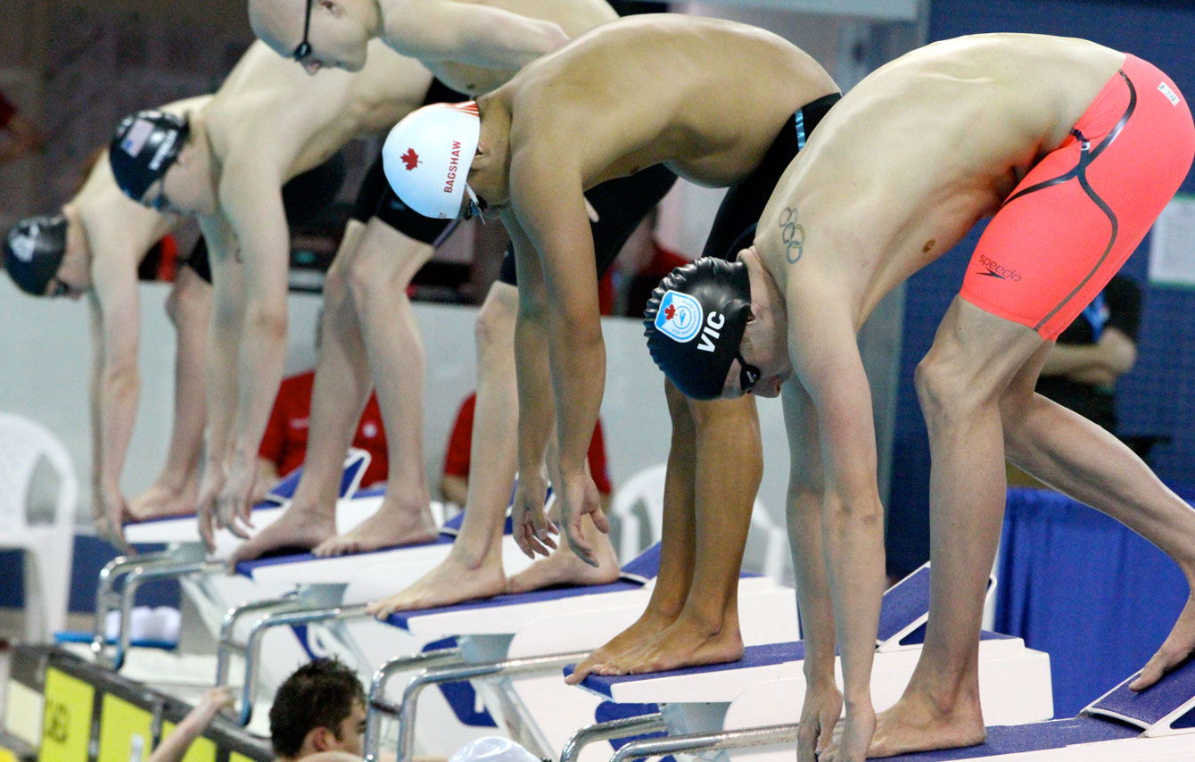 Ryan Cochrane (right in "VIC" cap) at the start of the 400m freestyle on April 7, 2016 (Photo: Patricia Armstrong Corsini via Swimming Canada). 
