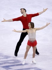 Meagan Duhamel, Eric Radford Meagan Duhamel and Eric Radford, of Canada, compete during the pairs short program in the World Figure Skating Championships, Friday, April 1, 2016, in Boston. (AP Photo/Elise Amendola)