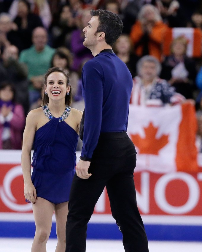 Meagan Duhamel and Eric Radford show relief after a monstrous performance in the free skate at the ISU Figure Skating World Championships on April 2, 2016.