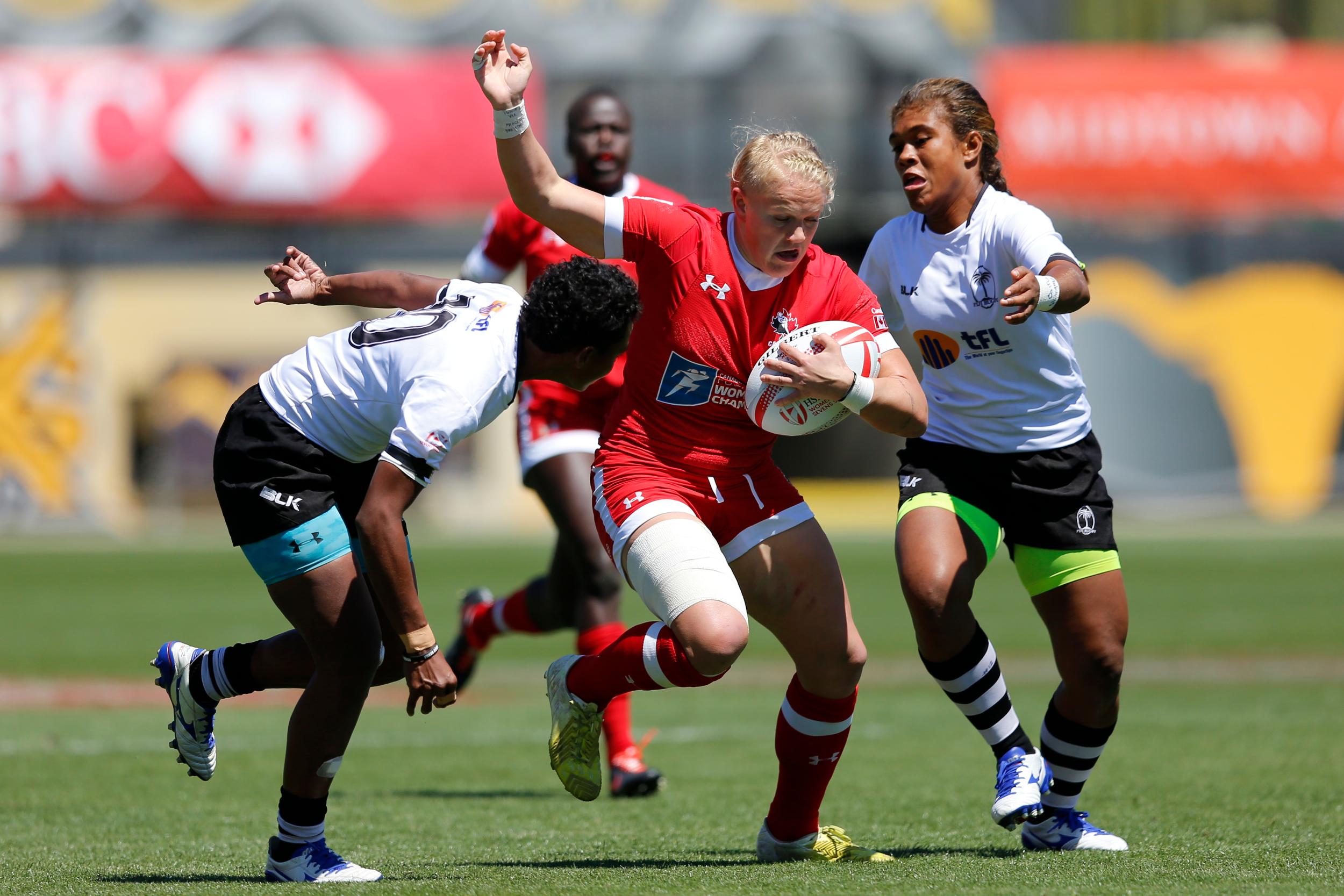 Sara Kaljuvee breaks free from Fiji tackle at Atlanta 7s (Photo: Mike Lee @ KLC Fotos).