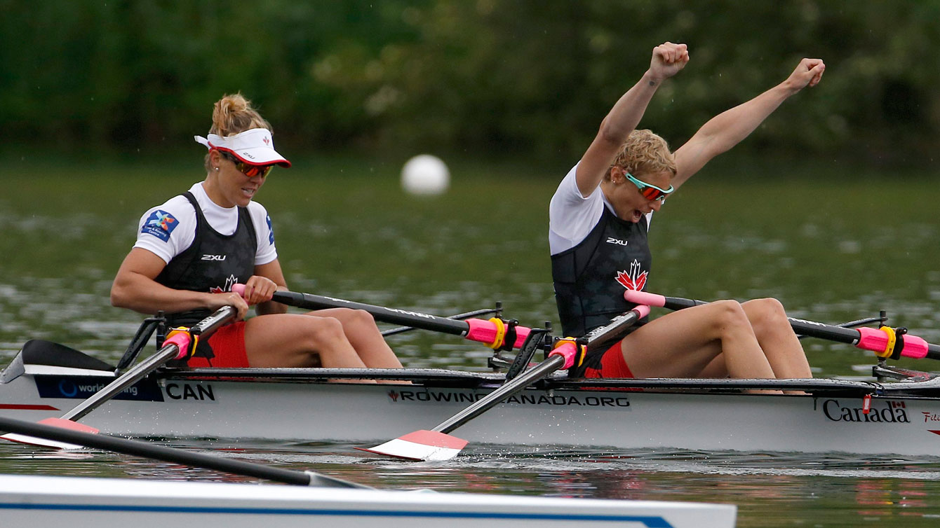 Patricia Obee (right), and Lindsay Jennerich celebrate winning gold at World Rowing Cup II final in Lucerne, Switzerland on May 29, 2016.