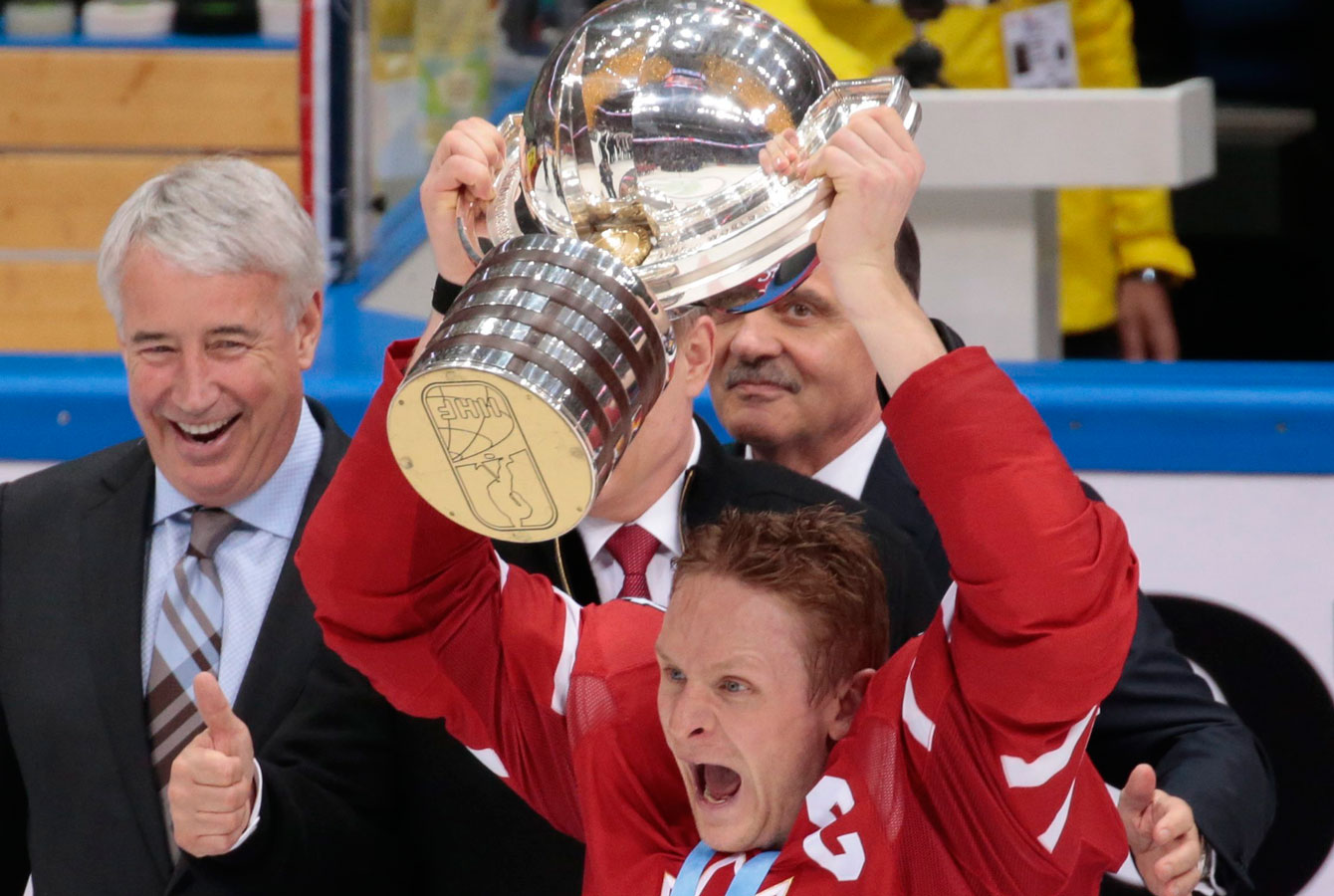 Corey Perry holds up the IIHF World Championship trophy after Canada beat Finland 2-0 on May 22, 2016.